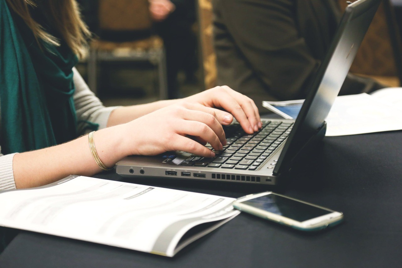 Woman typing writing windows